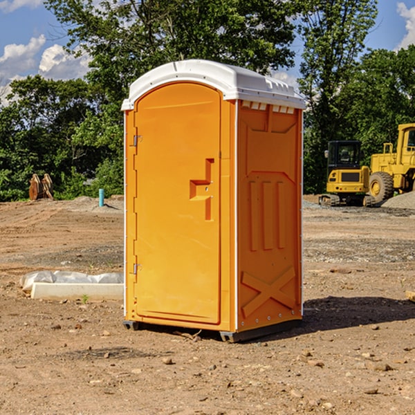 what is the cost difference between standard and deluxe portable toilet rentals in Denmark